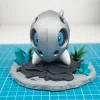 Mô hình Aron Pokémon giáp bạc mắt xanh kèm đế đá tinh thể in 3D