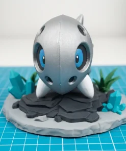 Mô hình Aron Pokémon giáp bạc mắt xanh kèm đế đá tinh thể in 3D
