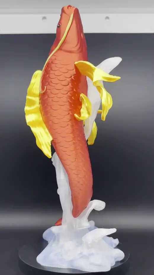 Ảnh động tượng cá chép vượt vũ môn in 3D đỏ vàng