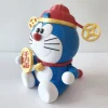 Doraemon thần tài đội mũ đỏ cầm đồng tiền vàng