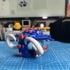 Mô hình Great Tusk Pokémon đôi ngà trắng và giáp xanh gai đỏ