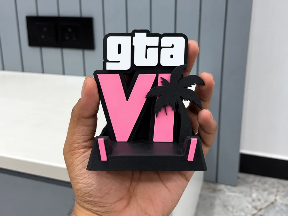 Giá đỡ điện thoại GTA VI in 3D hồng đen ảnh thực tế