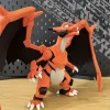 Mô hình Mecha Charizard Pokémon giáp cam, cánh đen – góc nhìn phía trước