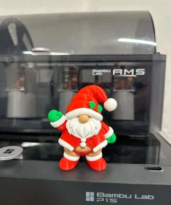 Ông già Noel mini mũm mĩm in 3D râu trắng găng tay xanh vẫy chào