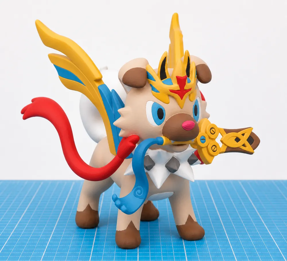 Mô hình Rockruff cosplay Zacian ngậm Honedge Pokémon