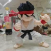 Mô hình Ryu chibi Street Fighter võ phục trắng, băng đầu đỏ, tư thế thủ võ