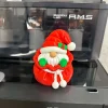 Ông già Noel mini trong túi quà đỏ in 3D nhìn chính diện