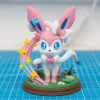 Sylveon Chibi trắng hồng ruy băng ngôi sao và đế cỏ 14cm